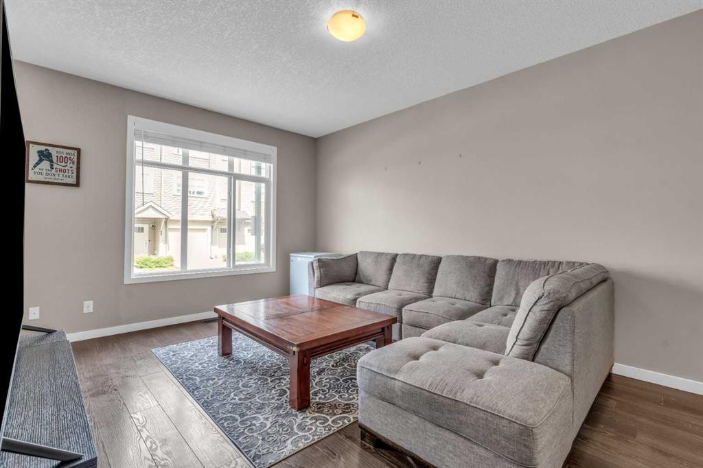93 Copperstone Common Se, Calgary, AB - Indoor Photo Showing Living Room