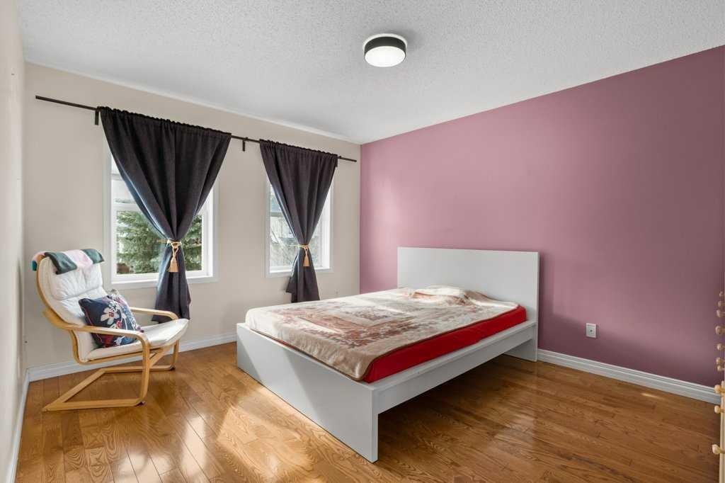 163 Eversyde Circle Sw, Calgary, AB - Indoor Photo Showing Bedroom