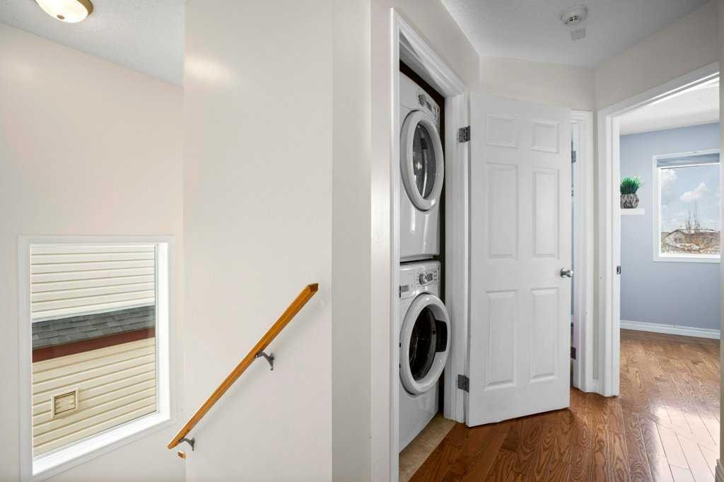 163 Eversyde Circle Sw, Calgary, AB - Indoor Photo Showing Laundry Room