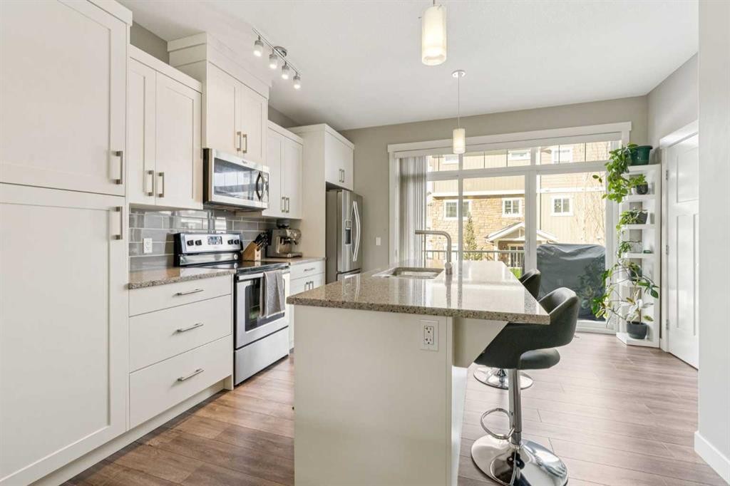 645 Evanston Manor Nw, Calgary, AB - Indoor Photo Showing Kitchen With Stainless Steel Kitchen