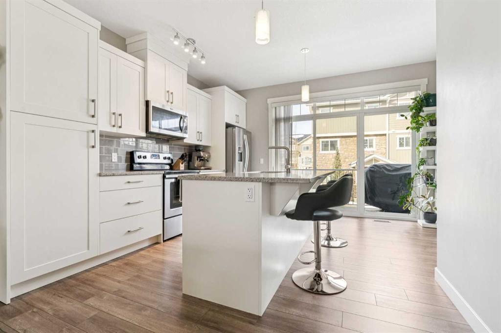 645 Evanston Manor Nw, Calgary, AB - Indoor Photo Showing Kitchen With Upgraded Kitchen