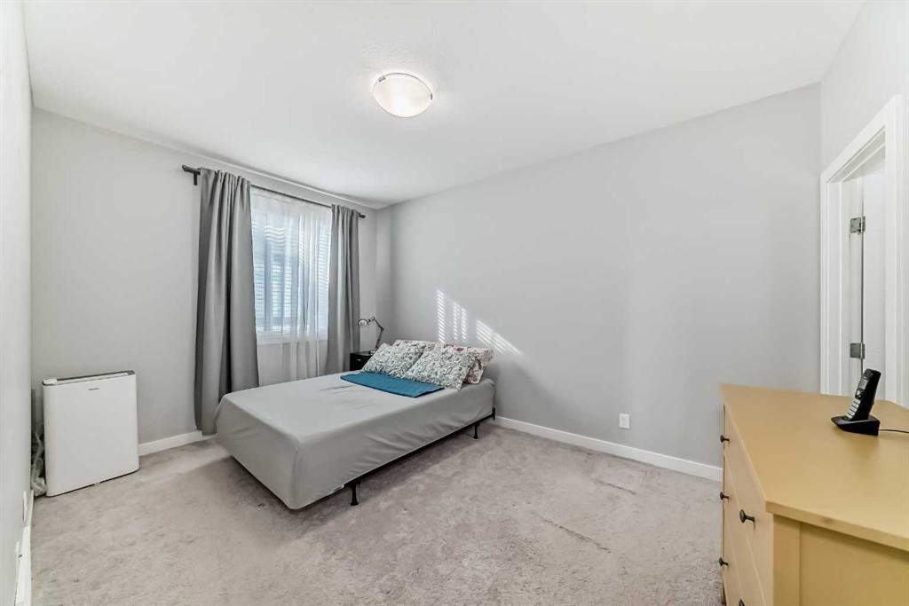 111 Redstone Crescent Ne, Calgary, AB - Indoor Photo Showing Bedroom