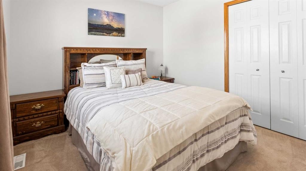 323 Mt Cornwall Circle Se, Calgary, AB - Indoor Photo Showing Bedroom