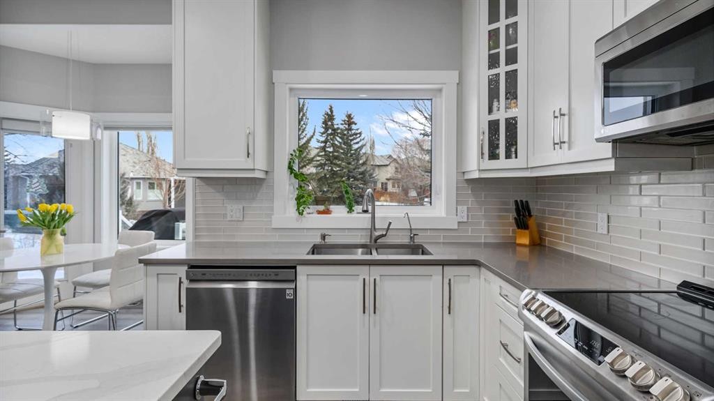 39 Mt Douglas Point Se, Calgary, AB - Indoor Photo Showing Kitchen With Stainless Steel Kitchen With Double Sink