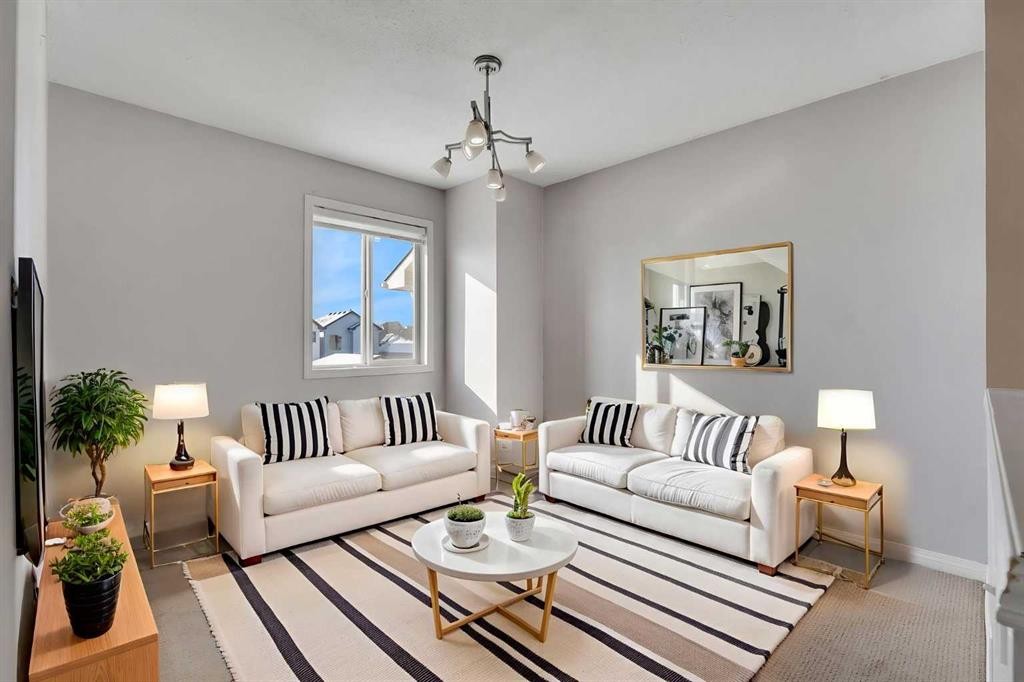 440 Prestwick Circle Se, Calgary, AB - Indoor Photo Showing Living Room