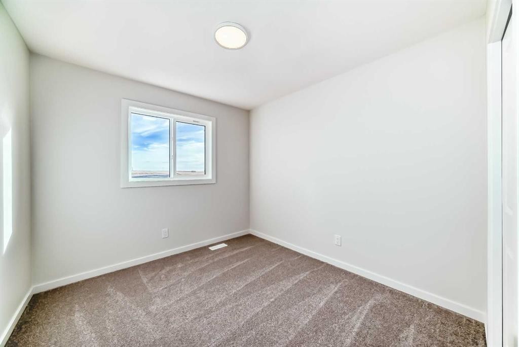 138 Lanark Gate Se, Airdrie, AB - Indoor Photo Showing Other Room