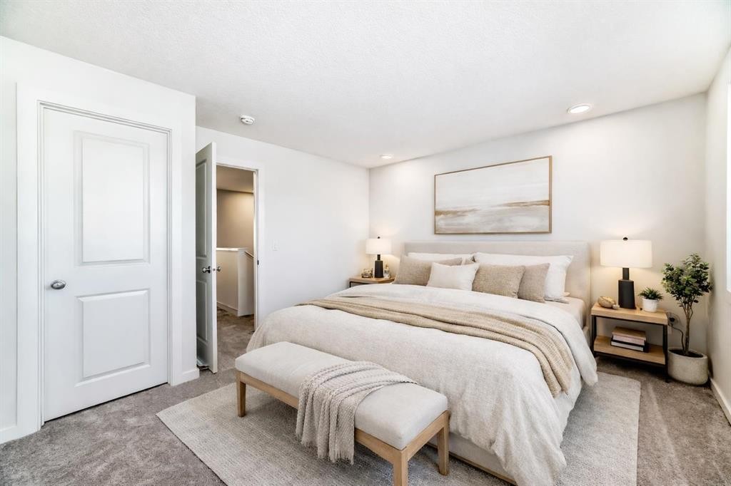 138 Lanark Gate Se, Airdrie, AB - Indoor Photo Showing Bedroom