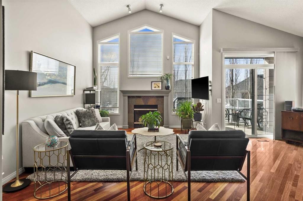 93 Cranwell Place Se, Calgary, AB - Indoor Photo Showing Living Room With Fireplace