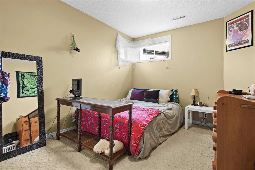 93 Cranwell Place Se, Calgary, AB - Indoor Photo Showing Bedroom