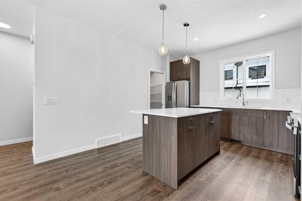 120-1750 Rangeview Drive Se, Calgary, AB - Indoor Photo Showing Kitchen With Upgraded Kitchen