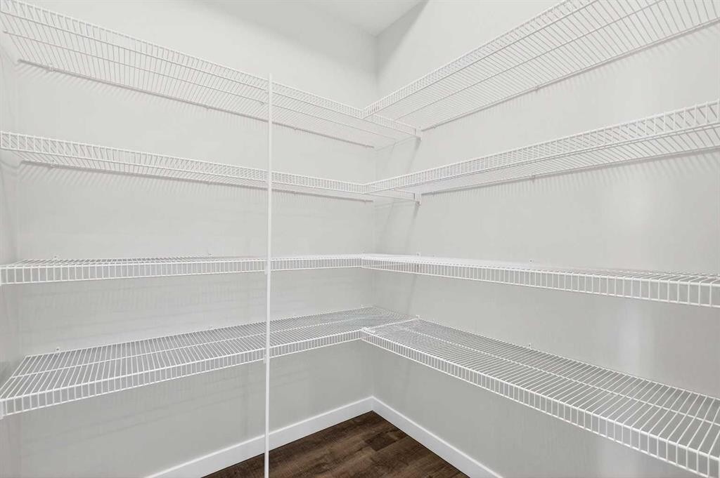 120-1750 Rangeview Drive Se, Calgary, AB - Indoor With Storage