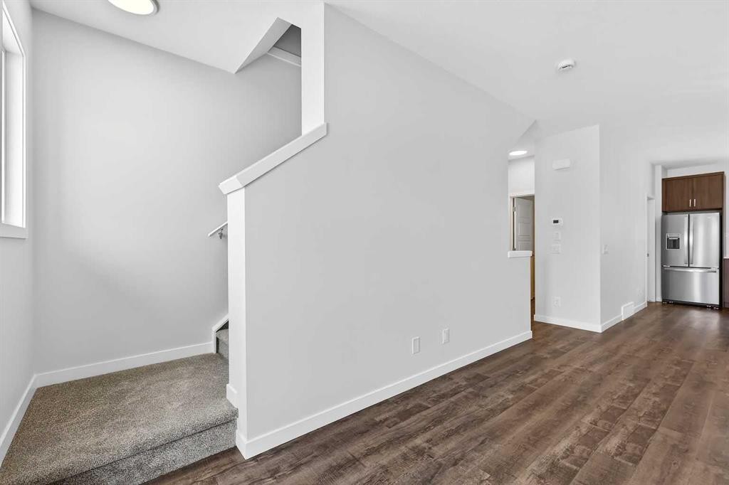 120-1750 Rangeview Drive Se, Calgary, AB - Indoor Photo Showing Other Room