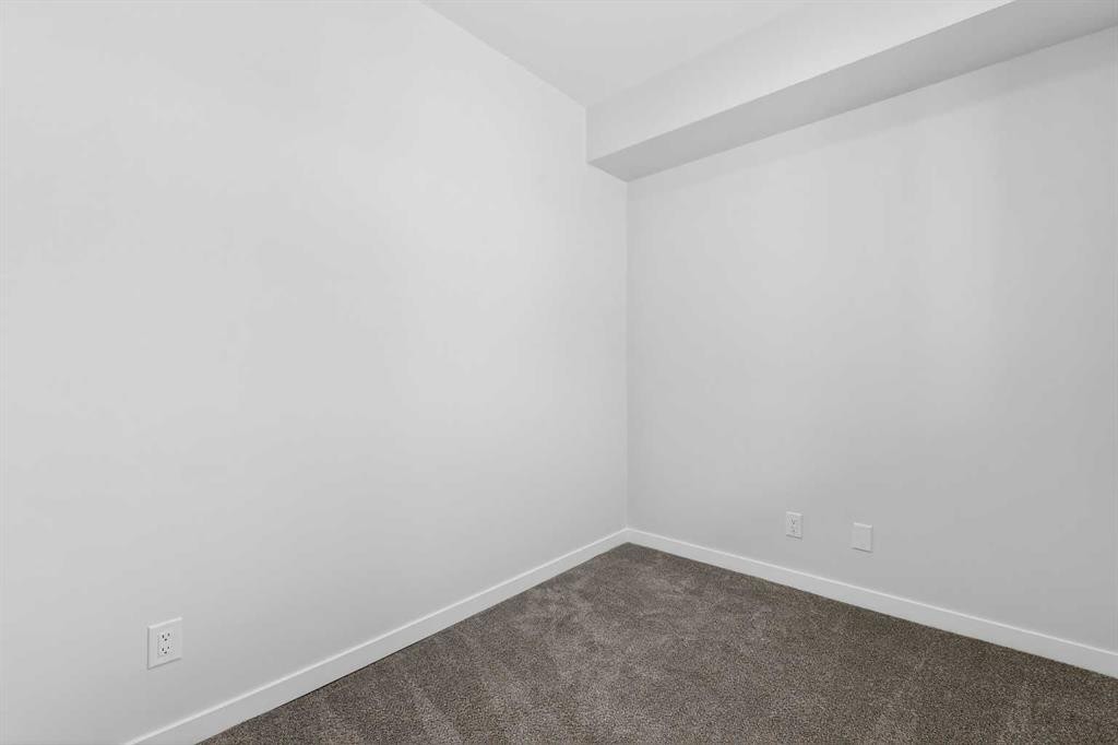 120-1750 Rangeview Drive Se, Calgary, AB - Indoor Photo Showing Other Room