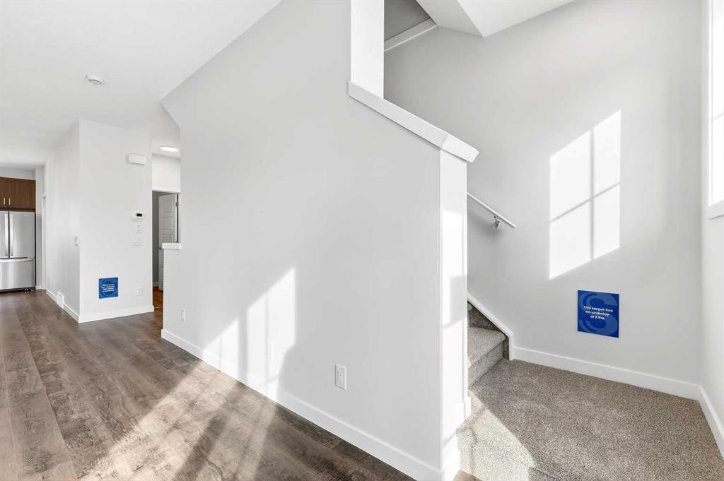 117-1750 Rangeview Drive Se, Calgary, AB - Indoor Photo Showing Other Room