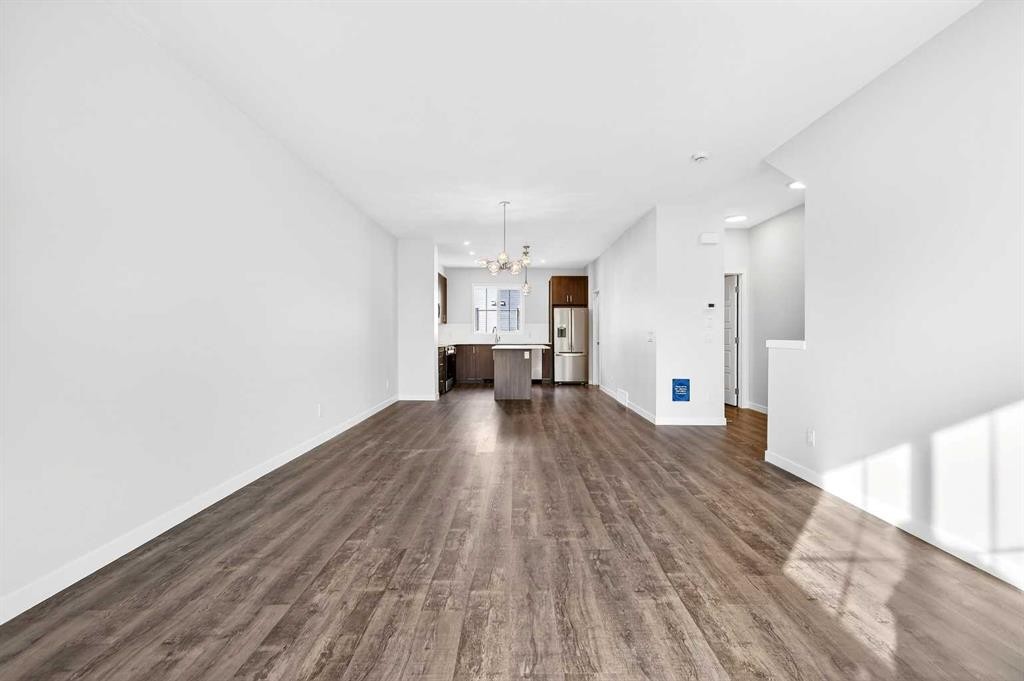 117-1750 Rangeview Drive Se, Calgary, AB - Indoor Photo Showing Other Room