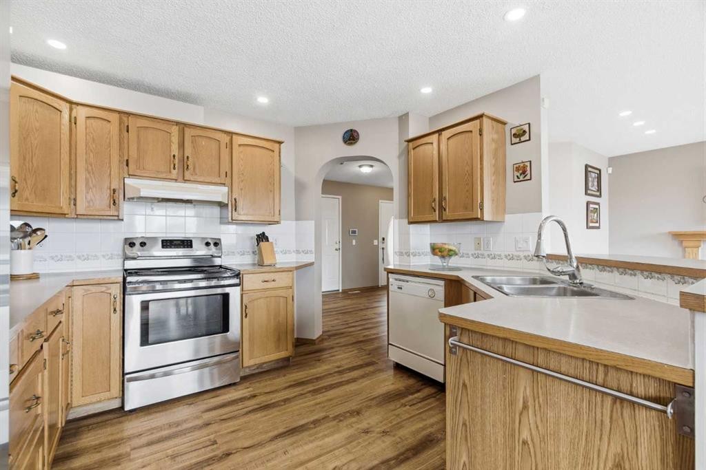 105 Douglas Ridge Circle Se, Calgary, AB - Indoor Photo Showing Kitchen With Double Sink
