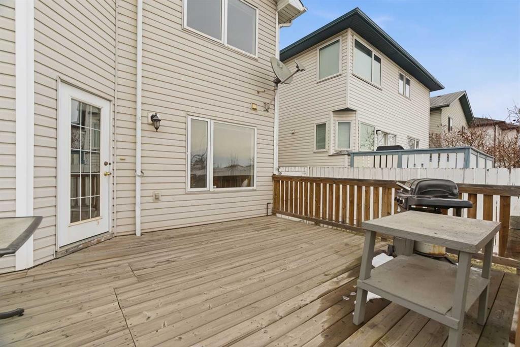 105 Douglas Ridge Circle Se, Calgary, AB - Outdoor With Deck Patio Veranda With Exterior