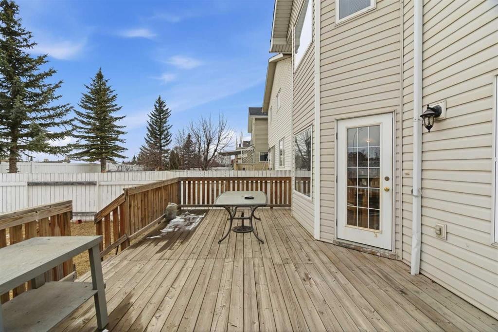 105 Douglas Ridge Circle Se, Calgary, AB - Outdoor With Deck Patio Veranda With Exterior