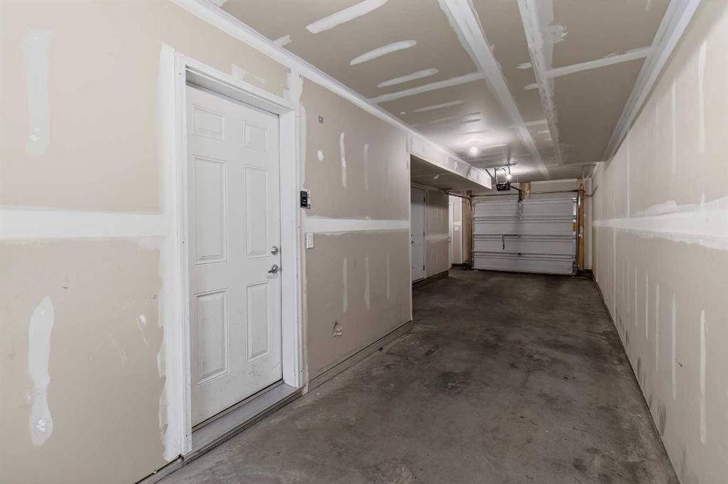 43 Redstone Circle Ne, Calgary, AB - Indoor Photo Showing Garage