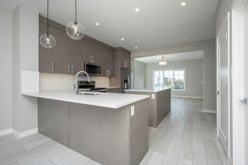 141 Dawson Wharf View, Chestermere, AB - Indoor Photo Showing Kitchen