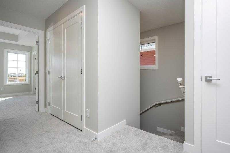 141 Dawson Wharf View, Chestermere, AB - Indoor Photo Showing Other Room