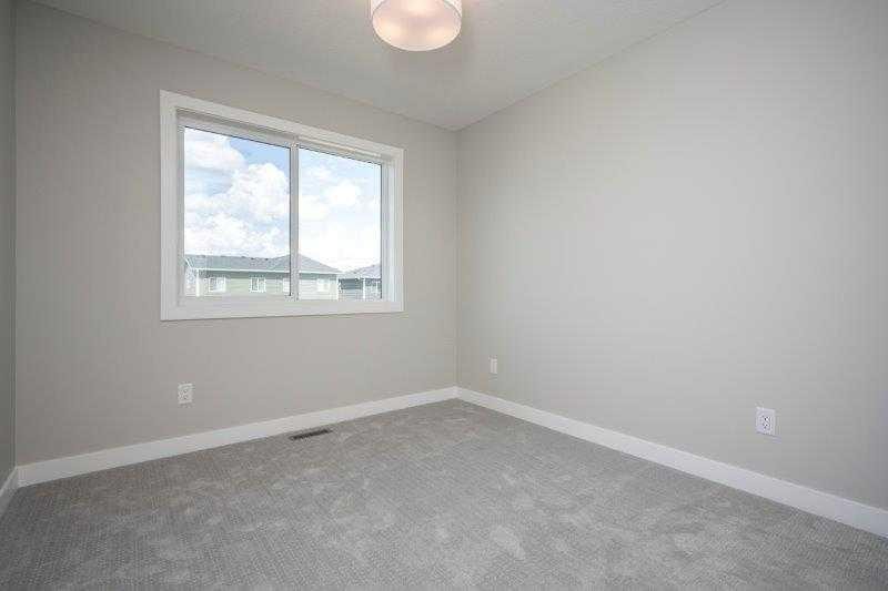 141 Dawson Wharf View, Chestermere, AB - Indoor Photo Showing Other Room