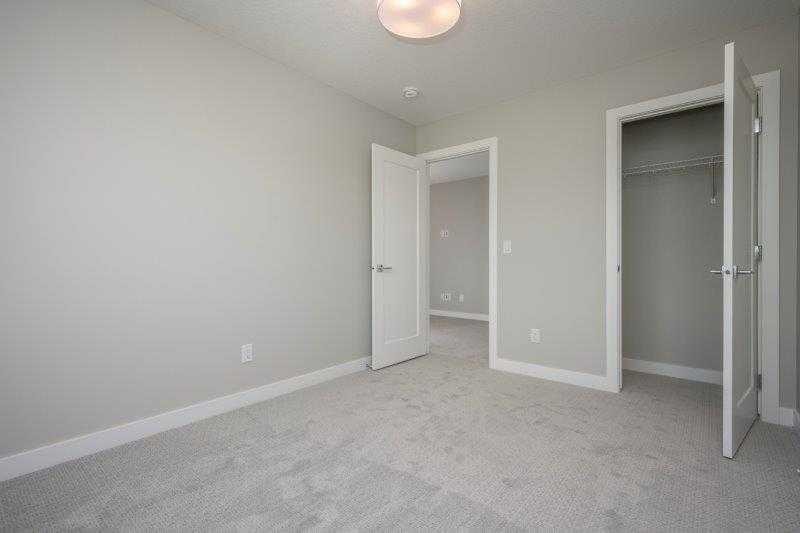 141 Dawson Wharf View, Chestermere, AB - Indoor Photo Showing Other Room
