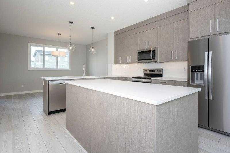 141 Dawson Wharf View, Chestermere, AB - Indoor Photo Showing Kitchen With Upgraded Kitchen