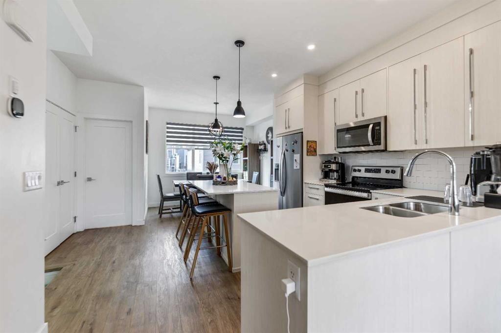 1209 Cornerstone Street Ne, Calgary, AB - Indoor Photo Showing Kitchen With Double Sink With Upgraded Kitchen