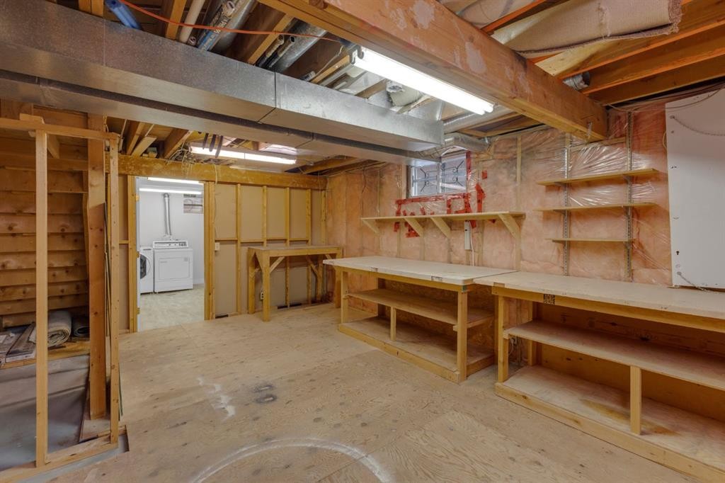 27 Berwick Place Nw, Calgary, AB - Indoor Photo Showing Basement