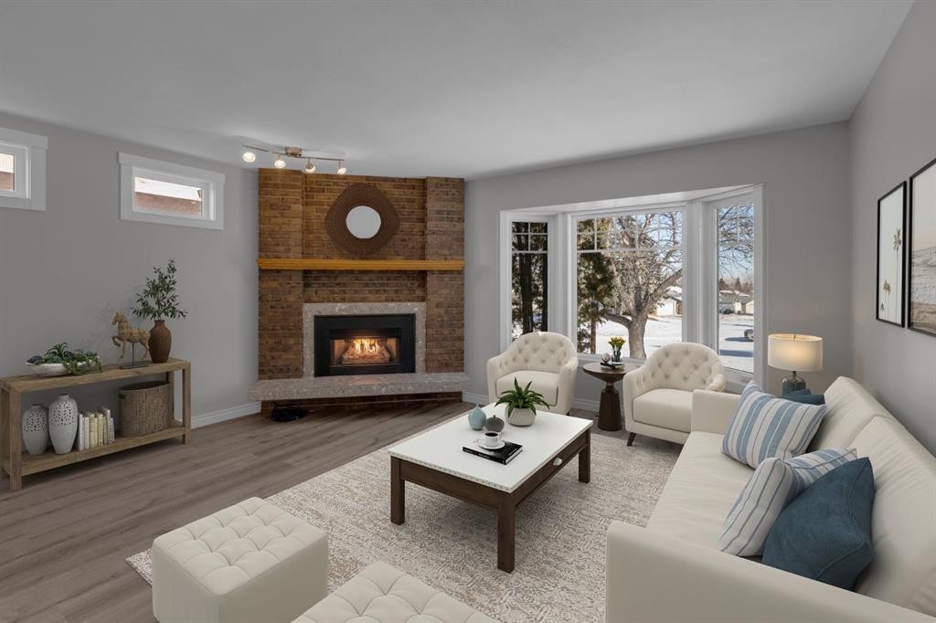 27 Berwick Place Nw, Calgary, AB - Indoor Photo Showing Living Room With Fireplace