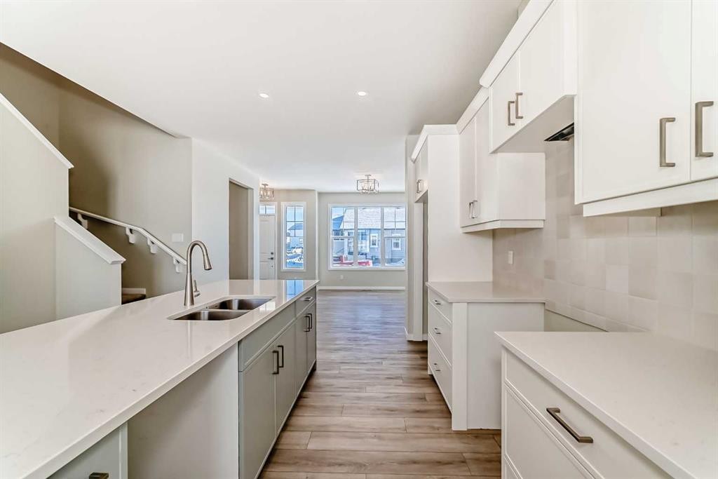 354 Ellen Park, Crossfield, AB - Indoor Photo Showing Kitchen With Double Sink