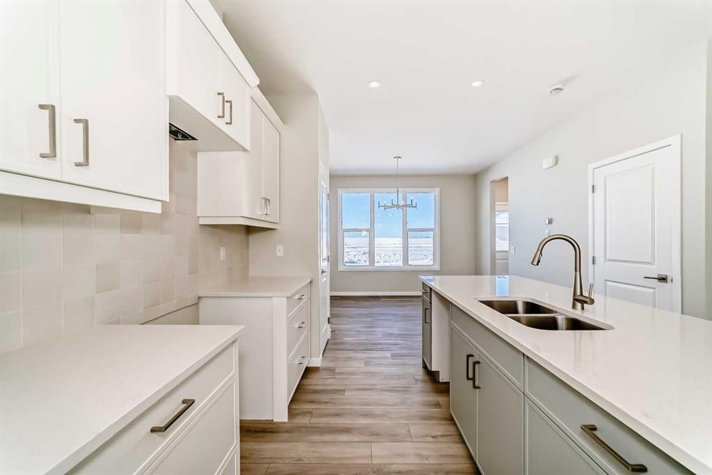 354 Ellen Park, Crossfield, AB - Indoor Photo Showing Kitchen With Double Sink