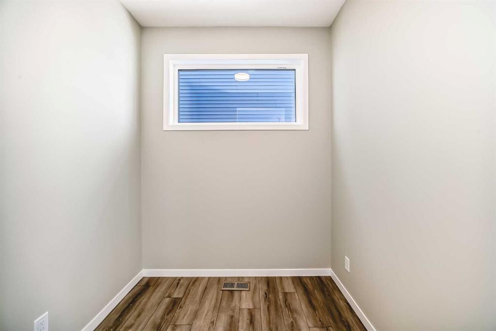 354 Ellen Park, Crossfield, AB - Indoor Photo Showing Other Room