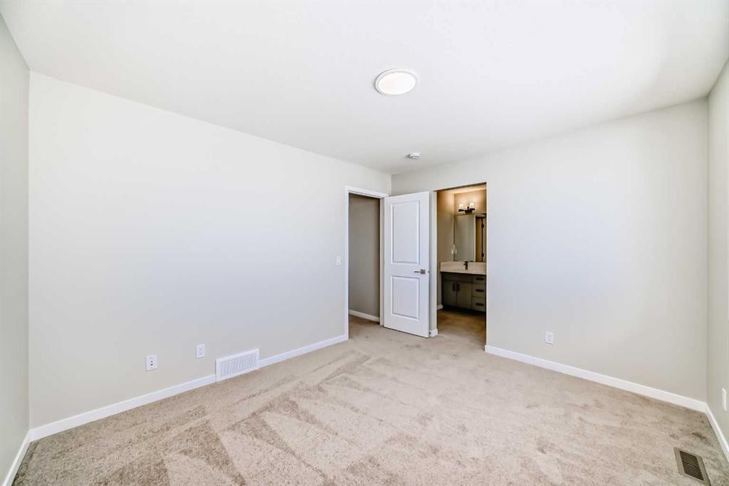 354 Ellen Park, Crossfield, AB - Indoor Photo Showing Other Room