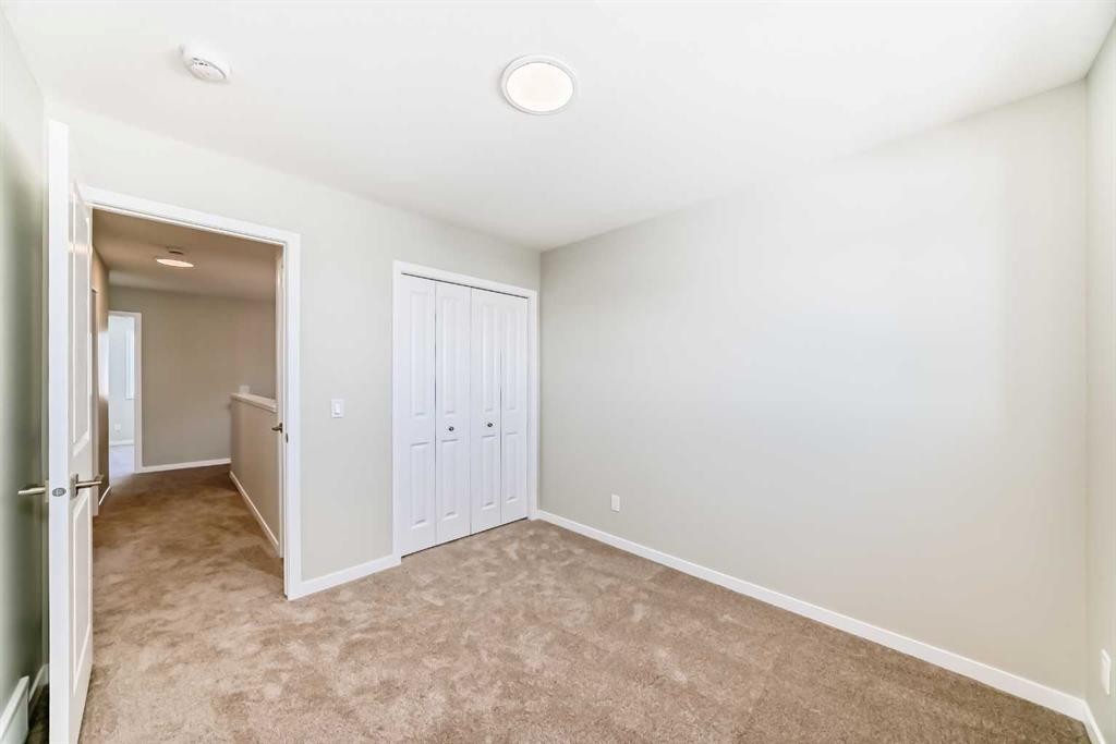 354 Ellen Park, Crossfield, AB - Indoor Photo Showing Other Room