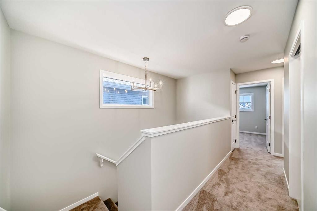 354 Ellen Park, Crossfield, AB - Indoor Photo Showing Other Room