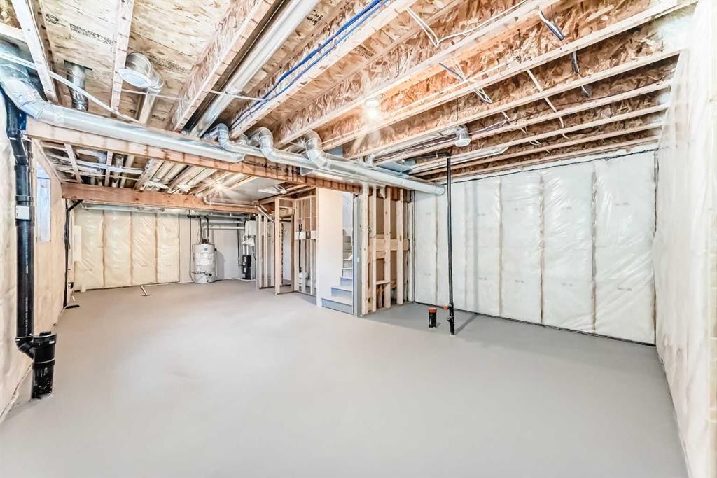 354 Ellen Park, Crossfield, AB - Indoor Photo Showing Basement