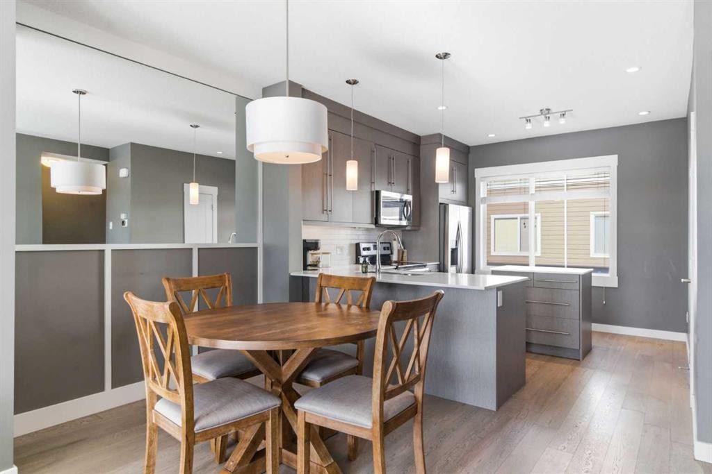 33-111 Rainbow Falls Gate, Chestermere, AB - Indoor Photo Showing Dining Room