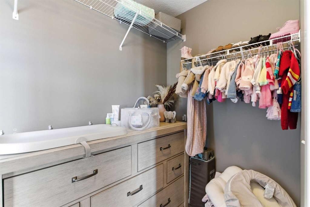 33-111 Rainbow Falls Gate, Chestermere, AB - Indoor With Storage