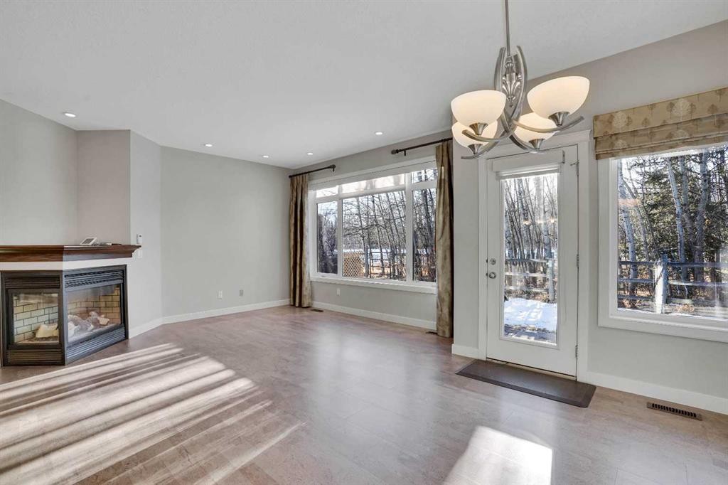 27-925 Imperial Drive, Diamond Valley, AB - Indoor With Fireplace