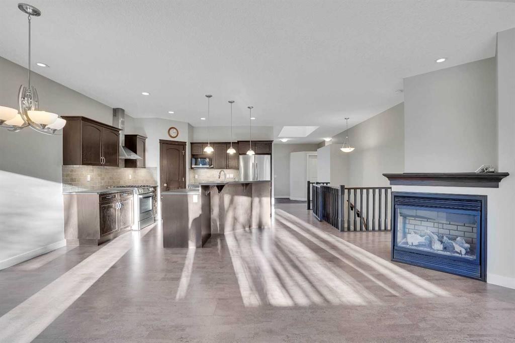 27-925 Imperial Drive, Diamond Valley, AB - Indoor Photo Showing Kitchen With Upgraded Kitchen