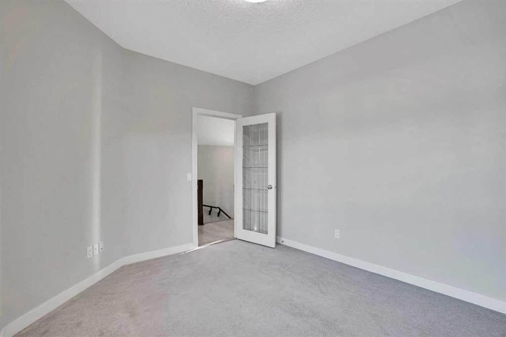 27-925 Imperial Drive, Diamond Valley, AB - Indoor Photo Showing Other Room