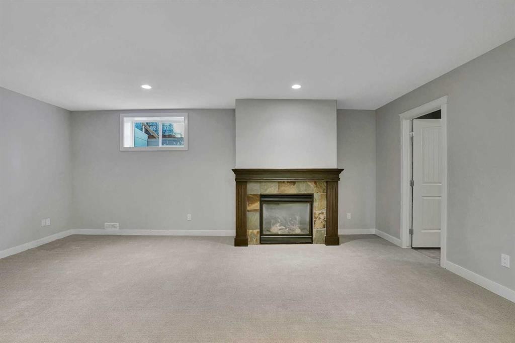 27-925 Imperial Drive, Diamond Valley, AB - Indoor With Fireplace