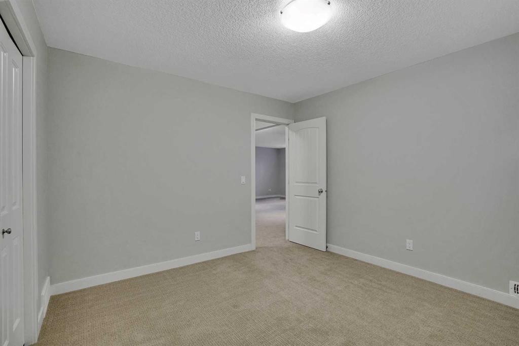 27-925 Imperial Drive, Diamond Valley, AB - Indoor Photo Showing Other Room