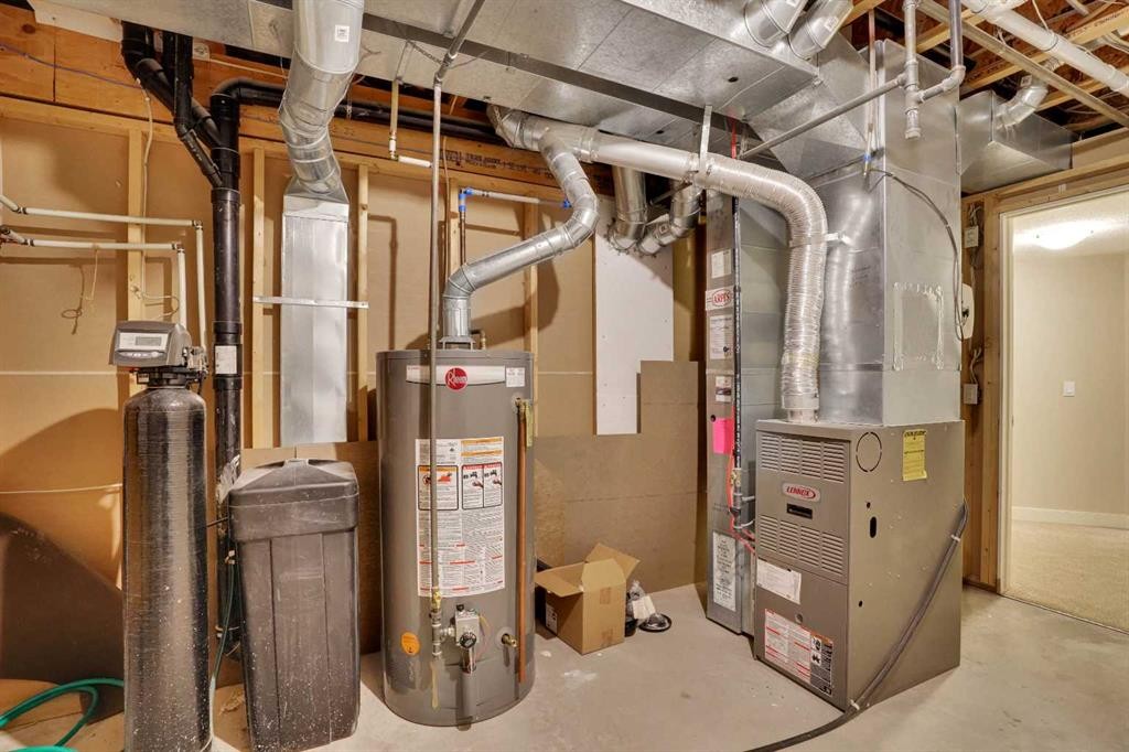 27-925 Imperial Drive, Diamond Valley, AB - Indoor Photo Showing Basement