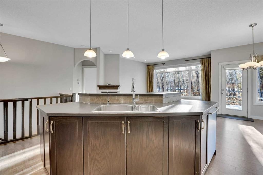 27-925 Imperial Drive, Diamond Valley, AB - Indoor Photo Showing Kitchen With Double Sink