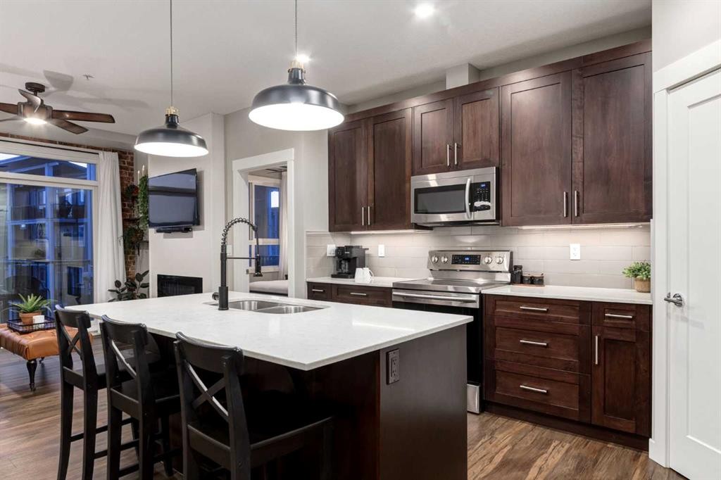 312-10 Walgrove Walk Se, Calgary, AB - Indoor Photo Showing Kitchen With Double Sink With Upgraded Kitchen