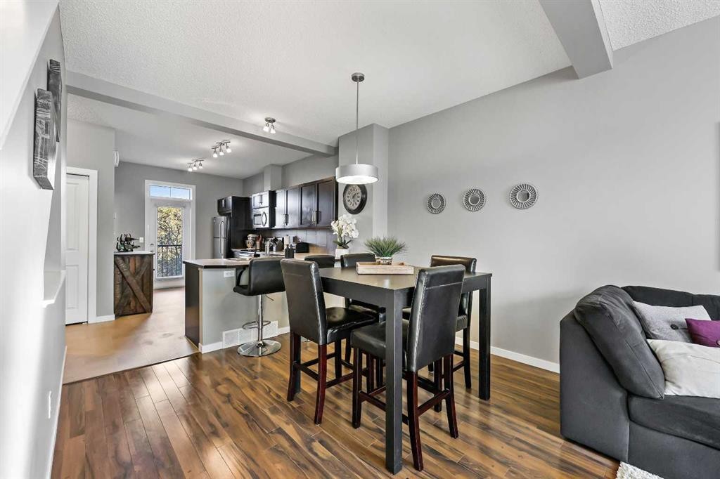 68 New Brighton Point Se, Calgary, AB - Indoor Photo Showing Dining Room