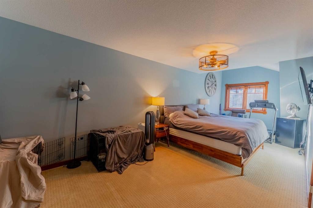 313-170 Crossbow Place, Canmore, AB - Indoor Photo Showing Bedroom